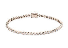 Round Diamonds set in Rose Gold