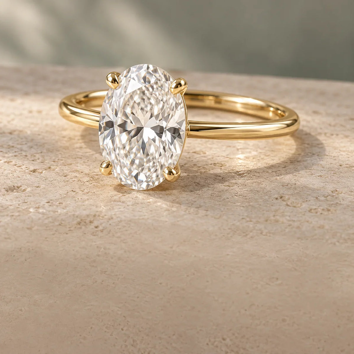 Close-up of a sparkling round diamond solitaire engagement ring on blue velvet